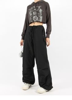 There’s a new trend in town, and it’s nightcity clothing’s Button Pocket Oversized Parachute Pants. These comfy, lightweight pants look great when paired with a crop top or graphic tee and sneakers. With a drawstring waistline, these pants are comfortable and secure, and the oversized fit gives them an effortless and chill look. Add these pants to your wardrobe, and you’ll never have a dull moment — you’ll always be ready for an impromptu night out, no matter how casual it might be.
Gender: Wome Lightweight Pants, Blue White And Black, Urban Wear, New Trend, Newest Trends, New Trends, Bottoms Pants, Black And Navy, Parachute Pants