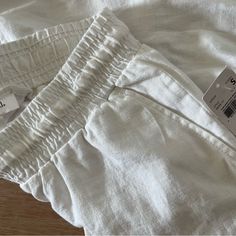 Size Small With Tags Maternity White Soft Linen Pants White Tapered Leg Bottoms With Loosely Fitted Hips, White Straight Leg Bottoms With Pull-on Style, White Straight Leg Pull-on Bottoms, White Pull-on Style Bottoms For Daywear, White Pull-on Style Bottoms For Spring, White Pants With Elastic Waistband For Daywear, White Relaxed Fit Linen Bottoms, White Pull-on Style Pants For Spring, White Relaxed Fit Pants With Elastic Waistband