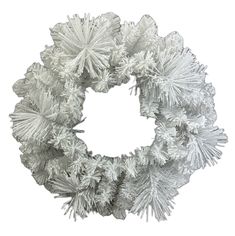 a white wreath with snow flakes hanging from it's sides on a white background