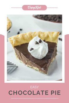 a slice of chocolate pie on a plate with whipped cream and chocolate chips around it