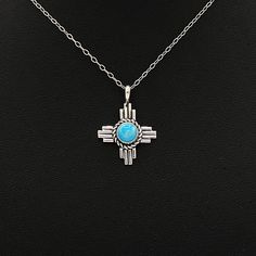 A beautiful blue Kingman stone sits in the center of this Zia, two cherished icons in NM come together. Size: 7/8″ x 3/4″ Stone: 6mm Chain: 18″ *NWS Mexican Icons, New Mexican, Come Together, Turquoise Stone, Beautiful Blue, Size 7, Turquoise, Pendant Necklace, Chain