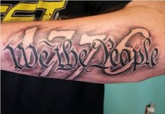 a man's arm with the words we are people written on it in black ink