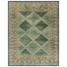 a green rug with an intricate design on the front and back side, in various colors