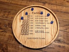 a wooden board with dices and numbers on it