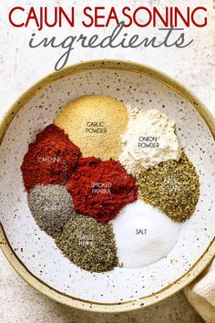 the ingredients for cajun seasoning in a bowl