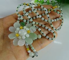 Condition: New Shape / Type: bead necklace Material / Gem : natural jade / jadeite Handling: standard international shipping ( 3-4 weeks delivery ) Level : Grade A Size: bead 3 mm, flower 5mm, length: 600 mm Origin: China Colors and varieties:Green Luster: vitreous luster Surface texture : medium grain Condition: Good PS: There are 10 different necklaces. Please see the different 10 photos. When you purchase it, please kindly tell me the photo number. We choose the correct necklace for you. Deli Texture Medium, Luxury Pens, Necklace Bead, Beautiful Pen, Writing Gifts, Emerald Pendant, Natural Jade, Bead Necklace, Live Lokai Bracelet