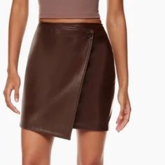 Nwot High Waisted Mini Front Wrap Skirt Vega Leather - Looks And Feels Like The Real Thing Fits Sizes Xs And S Measurements Included In Pics Aritzia Skirt, Brown Leather Skirt, Olive Skirt, Plaid Pleated Mini Skirt, Pink Midi Skirt, Black Leather Mini Skirt, Vegan Leather Skirt, Faux Suede Skirt, Wool Mini Skirt