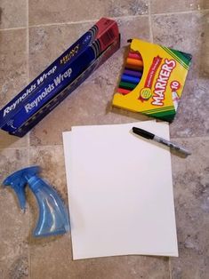 the supplies needed to make an art project are laid out on the floor