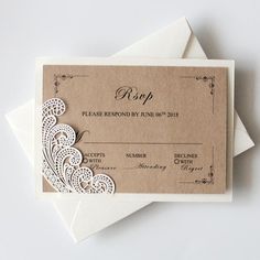 an envelope with some paper cutouts on it and a note attached to the front