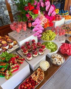 a table filled with lots of different types of food