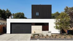 a modern house with black and white architecture