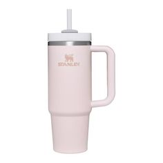 a pink travel mug with a straw sticking out of it's top and the words stanley on it