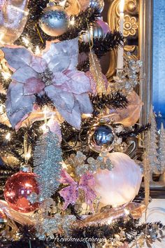 a christmas tree decorated with ornaments and lights