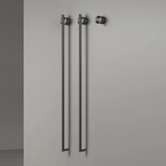 an image of two metal handles on the wall