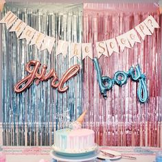 a birthday party with balloons, streamers and cake