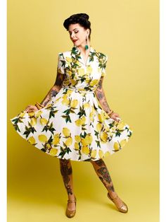 In need of a few more lemons, gals??Crafted in cotton the turndown collar is framed by the darling short sleeve and is centered by a natural waist for a dash of retro accent.?This gorgeous floral frock is cut to perfection with a 1950s style fit and flare line that works wonders with curves. Petticoats added for volume sold separately >> ? Color:?Yellow Sleeve: Short Sleeve Length: Knee-Length Stretch: Little Stretch Closure: Button Package Content: 1 x Dress Care Instructions: Machine Was Fitted Short Sleeve Dress With Lemon Print, White Short Sleeve Lemon Print Dress, White Short Sleeve Dress With Lemon Print, Retro Stage, Floral Frocks, Plus Size Prom, Circle Dress, Sequin Evening Dresses, Standard Dress