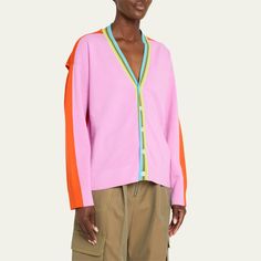 CHRISTOPHER JOHN ROGERS convertible knit cardigan in an allover colorblock styling  V-neckline Button closure Long sleeves; cutout details at back  Ribbed trim  Hip length  Relaxed fit  Wool/viscose/elastane Dry clean Imported Multicolor V-neck Color Block Cardigan, Spring Color Block Cardigan For Casual Wear, Spring Color Block Cardigan For Layering, Multicolor Color Block Cardigan, Spring Color Block Pink Cardigan, Spring Pink Color Block Cardigan, Spring Color Block V-neck Cardigan, V-neck Color Block Cardigan For Layering, Spring Color Block Cardigan