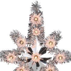 a silver and white snowflake ornament with lights