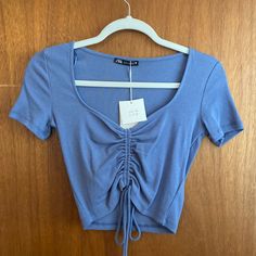 Ribbed Material Blue Fitted Casual Top, Zara Fitted Casual Tops, Zara Casual Fitted Tops, Zara Casual Tops, Trendy Blue Zara Tops, Trendy Light Blue Zara Tops, Casual Blue Zara Tops, Zara Blue T-shirt For Spring, Blue Stretch Tops By Zara