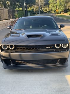 the front end of a black dodge car