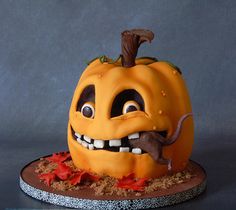 there is a cake that looks like a pumpkin