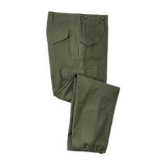 Our sturdy Field Cargo Pants combine the double-layer reinforcing of Filson's legendary Double Tin Cloth Pants with the utilitarian fit and fabric of pants issued to WWII-era troops. We patterned these field pants directly after those issued by the U.S. Army in 1941, in a reverse sateen weave true to the original. They’re cut roomy through the seat and thighs to ensure unrestricted ease of motion, featuring darts at the waist and knees for a better fit. Front and rear pockets are protected by fl Green Outdoor Work Pants With Pockets, Green Work Pants With Pockets For Outdoor, Green Combat Pants For Outdoor Activities, Khaki Hunting Pants With Pockets, Green Military Cargo Pants For Outdoor, Green Cargo Pants With Pockets For Outdoor Work, Combat Style Cargo Pants For Hunting, Green Utility Work Pants For Outdoor, Combat Green Pants With Multiple Pockets