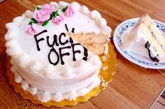 there is a cake that has been decorated with flowers and the words fuc off on it