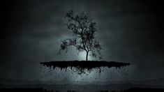 a tree on an island in the dark