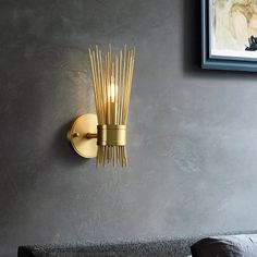 a wall light that is next to a couch