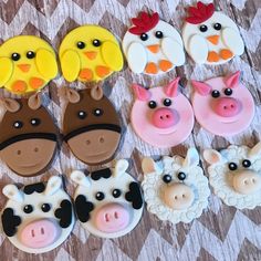 several decorated cookies with farm animals on them