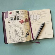 an open notebook with notes and pens on it