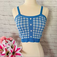 Item: Knit Crop Top Brand: Boutique Size: Xs Colour: Blue, White Features: Gingham Pattern With Solid Blue Trim, Heart Button Detailing On The Front Material: Unknown Shipping: $4.99 Condition: New. No Holes, Stains Or Tears Measurements: - Length: 15” - Bust: 28”- 34” Blue Knit Tops With Button Closure, Cute Blue Knit Tops, Trendy Blue Tops For Picnic, Trendy Blue Top For Picnic, Knit Gingham, American Eagle Cardigan, Black Tank Top Women, Twist Front Crop Top, Gingham Top