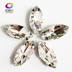 four pieces of clear colored crystal stone on white background with the words xixii diamond