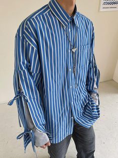 Weave Studio Blue Striped Oversized Button-Down Shirt - Long Sleeve L Urban Style Relaxed Fit Shirt, Luxury Striped Cuffs Outerwear For Streetwear, Luxury Outerwear With Striped Cuffs For Streetwear, Luxury Oversized Tops With Striped Collar, Blue Cotton Shirt With Striped Cuffs, Blue Long Sleeve Shirt With Contrast Stripes, Casual Cotton Shirt With Tie Sleeves, Cotton Shirt With Tie Sleeves And Long Sleeve, Casual Long Sleeve Shirt With Tie Sleeves