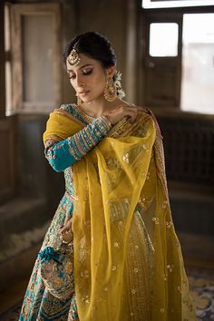 Traditional Pishwas Dupatta Pakistani Bridal Dress is a breathtaking attire adorned with Sequins, Beads, Dabka, and Naqshi. Custom sizes. Fast shipping. Mehndi Outfit Bridal, Ethereal Fabric, Pakistani Mehndi Dress, Yellow Dupatta, Bridal Mehndi Dresses, Pakistani Bridal Dress, Haldi Outfits, Asian Clothing, Mehndi Dress