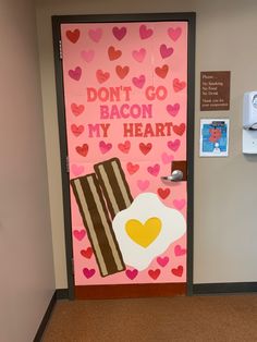 a door decorated with bacon, eggs and hearts