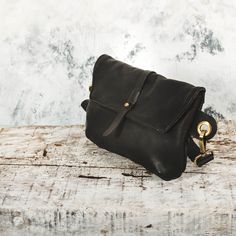 This Black Leather Woman Bag is the ideal bag if you like carrying all your necessities, keep your hands free and look effortlessly fashionable at the same time! Perfect for festivals, markets and travelling. Simple and beautiful black bag made of a high quality italian sovage leather. which is Comfortable to touch, strong, durable and a very fine material. Top grade thicker leather is used for the adjustable belt. This hip bag features 2 separate compartment closed by a zipperS ,Securely carrie Black Leather Pouch For Daily Use, Black Tote Chest Bag For Daily Use, Black Tote Chest Bag For Everyday Use, Black Leather Backpack With Phone Pocket For Daily Use, Black Leather Camera Bag Pouch, Black Satchel Chest Bag With Detachable Strap, Soft Leather Pouch Saddle Bag For Travel, Soft Leather Saddle Bag Pouch For Travel, Black Leather Pouch For Mobile Phone