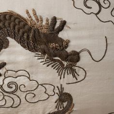 A Japanese silk dragon embroidery in high relief, late 19th century.  23 ½ by 20 inches Dragon Fabric, Dragon Embroidery, Sewing Tricks, Japanese Dragon, Japanese Silk, High Relief, Character Reference, Silver Hair, 19th Century