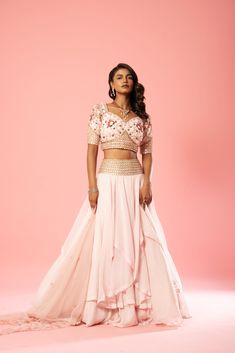 Featuring a baby pink coloured layered lehenga made of organza with intricate hand embroidery in blouse, belt and soft net dupatta. Embroidery In Blouse, Royal Blue Lehenga, Layered Lehenga, Ruffle Lehenga, Raw Silk Lehenga, Yellow Lehenga, Ivory Blouse, Criss Cross Top, Blue Lehenga