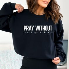 Scripture sweatshirt, Pray without ceasing. The collar is ribbed knit, so it retains its shape even after washing. There are no itchy side seams on these sweaters.  .: 50% cotton, 50% polyester .: Medium-heavy fabric .: Loose fit .: Sewn-in label .: Runs true to size Inspirational Letter Print Sweatshirt For Fall, Inspirational Slogan Sweatshirt For Fall, Inspirational Text Print Sweatshirt For Fall, Inspirational Long Sleeve Sweatshirt With Letter Print, Inspirational Letter Print Long Sleeve Sweatshirt, Inspirational Long Sleeve Letter Print Sweatshirt, Inspirational Winter Sweatshirt With Relaxed Fit, Inspirational Text Print Fall Sweatshirt, Inspirational Relaxed Fit Sweatshirt For Winter