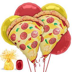 two heart shaped pizza balloons with pineapples on them