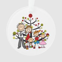 a family standing in front of a tree ornament