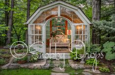 an image of a small house in the woods