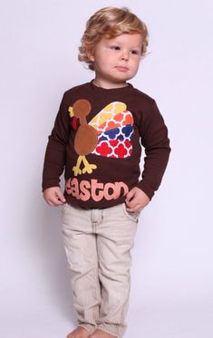 Gobble gobble! Your little turkey will look so cute in this adorable colorful turkey shirt with his name on it! Made from 100% cotton, boutique quality shirt or one-piece, the turkey applique is hand-cut from a selection of designer fabrics, then fused and top-stitched onto the shirt. Some fraying around the edges is expected after washing (wash inside out), but that will only add to the cute and vintage feel! Sizes: 0-3 month (one-piece) 3-6 month (one-piece) 6-12 month (one-piece or shirt) 12- Turkey Applique, Colorful Turkey, Turkey Shirts, Shirt For Boys, Boys Tops, Gobble Gobble, Thanksgiving Shirt, Thanksgiving Shirts, Color Shorts