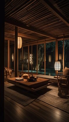 a living room filled with furniture and lots of windows