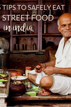 a man sitting on the ground with food in front of him and text that reads tips to safely eat street food in india