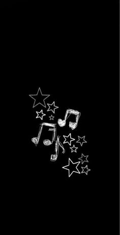 music notes and stars on a black background