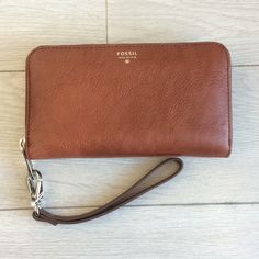 Never Used. Fossil Wristlet/Wallet. Able To Remove Wrist Strap To Use Just As A Wallet. Able To Fit Iphone 6 Inside. Formal Brown Wristlet With Wrist Strap, Everyday Rectangular Wristlet With Snap Closure, Classic Everyday Wristlet, Adjustable Clutch Wristlet For Everyday, Adjustable Everyday Clutch Wristlet, Elegant Brown Wristlet For Everyday Use, Classic Wristlet For Everyday Use, Classic Everyday Wristlet With Wrist Strap, Adjustable Clutch For Travel