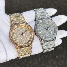 Step into elegance with this fully iced-out diamond timepiece that mirrors genuine luxury watches. We utilize premium simulated diamonds crafted from high-refractive crystals, ensuring a sparkle that rivals authentic diamonds under the light! INCLUDES AN EASY-TO-USE SIZE ADJUSTMENT TOOL Specifications: - Gender: Men's  - Case Size: 46mm - Movement: Quartz Movement - Battery: Included - Sizing: 8.5-inch band - Adjustable: Links are removable to fit your wrist - Back: Stainless Steel - Lock: Deployment Clasp - Stone: VVS Diamond Simulate - Case Material: Alloy - Finish: Gold/Silver Plating  Whether you're dressing up for casual days, or events, or gifting someone special on occasions like Graduations, Valentine's Day, Anniversaries, Birthdays, Thanksgiving, Christmas, New Year, or Father's D Luxury Wrist Watch For Men, Gold Diamond Watch With Rhinestones, Gold Crystal Watches With Rhinestones, Gold Rhinestone Crystal Watch, Metal Watches With Rhinestones, Gold Round Watch With Rhinestones, Gold Watches With Rhinestones, Gold Round Watches With Rhinestones, Party Watches With Rhinestones