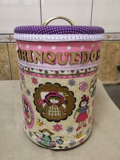 a pink and white container with pictures on it